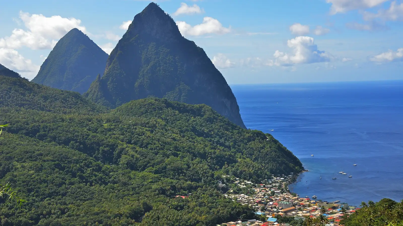 Aerial view of clear reef water for snorkeling between the Pitons on a st lucia snorkeling tour, Soufrière